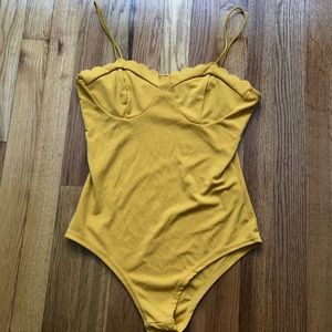 Yellow body suit